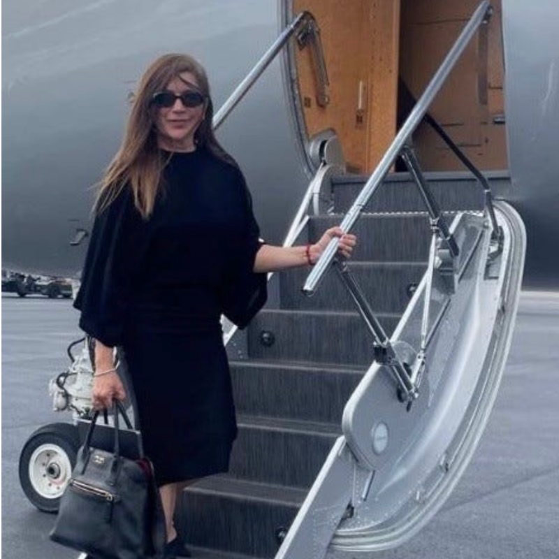 Jacqueline Astudillo outside a private aircraft