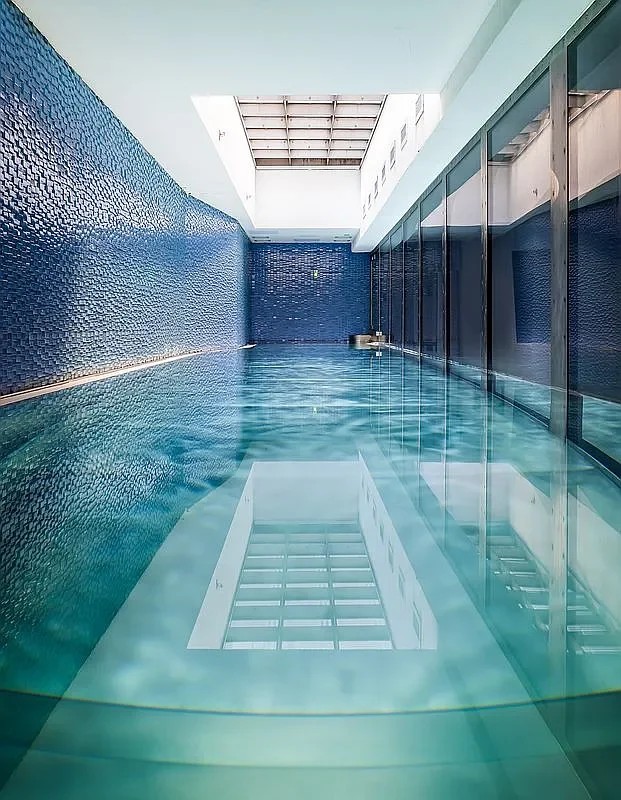 Stainless-steel indoor lap pool at 109 Waverly Place